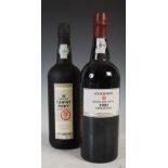 Two bottles of port, to include one bottle of Cockburn's 1991 vintage port, Quinta Dos Canais,