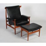 A mid-century Danish teak and black leather 'Bwana' Model No. 152 easy chair and matching stool,