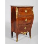 A late 19th / early 20th century French commode, of small proportions, a serpentine breche