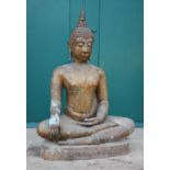 A large bronze figure of the Buddha, in the Thai style, seated in lotus pose, with a gilt and