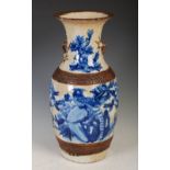 A large late 19th / early 20th century Chinese blue and white crackle glazed porcelain dragon