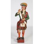 A large tobacco advertising figure of a Highlander, early 20th century, cast in resin/ composite and