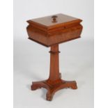 A 19th century mahogany teapoy, of moulded sarcophagus form with a flat top and gadrooned oval top