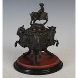 A 19th century Italian Grand Tour bronze cast lidded inkwell, the round body with three satyr