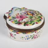 A French faience pottery snuff / patch box, of shell form, the top painted with a courting couple,