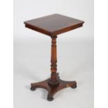 A 19th century rosewood occasional table, the top of rounded rectangular form on a turned single