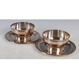 Puiforcat, a pair of French Art Deco silver plated bowls on integral stands, stamped marks,