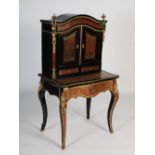 A late 19th / early 20th century French red tortoiseshell, cut brass and gilt metal Boulle style