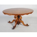 A rare Scottish Victorian elm, burr elm and mahogany centre table, the oval shaped top inlaid with a