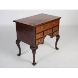 A late 18th / early 19th century American mahogany lowboy, the chamfered rectangular top with one