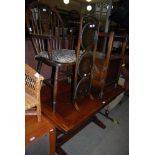 STAINED OAK EXTENDING DINING TABLE, TOGETHER WITH A STAINED BEECH WINDSOR TYPE ARMCHAIR, A THREE-