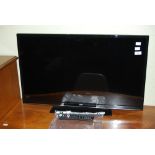 JVC 32" LED SMART TV WITH DVD PLAYER.