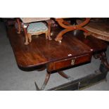 A 19TH CENTURY MAHOGANY DROP-LEAF PEDESTAL TABLE WITH TWO SINGLE END DRAWERS ON BALUSTER COLUMN WITH