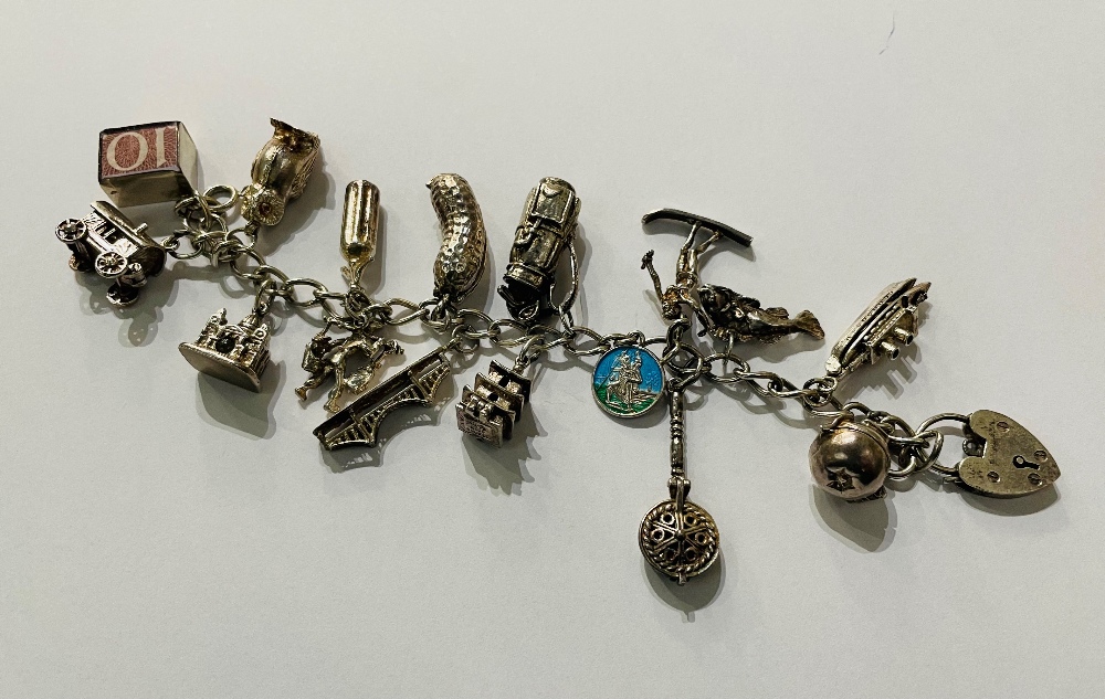 VINTAGE WHITE METAL CHARM BRACELET, BAG OF ASSORTED LOOSE CHARMS, AN EARLY 20TH CENTURY THREE - Image 2 of 2