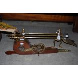 PAIR OF BRASS ANDIRONS, SET OF THREE FIRE IRONS, AND MAHOGANY AND BRASS BELLOWS.