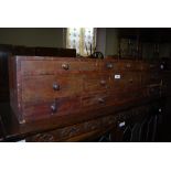 A 19TH CENTURY MAHOGANY TABLE TOP CABINET OF TEN DRAWERS.