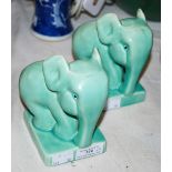 A PAIR ART DECO OF GREEN GLAZED SHORTER & SONS ELEPHANT FORM POTTERY BOOKENDS