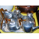A GROUP OF PICQUOT WARE ITEMS TO INCLUDE TWO TEA POTS, TWO COFFEE POTS, SUGAR AND CREAM WITH TRAY,