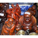 A CHINESE CARVED BAMBOO FIGURE OF BUDDHA, TOGETHER WITH ANOTHER CARVED WOOD FIGURE OF BUDDHA AND