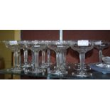 SET OF THIRTEEN EARLY 20TH CENTURY CHAMPAGNE COUPES WITH ETCHED SCROLL AND STAR DETAIL ON FACETED