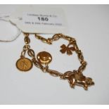 A 9CT GOLD CHARM BRACELET SUSPENDING FOUR CHARMS, GROSS WEIGHT 11.6 GRAMS.