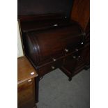 LATE 19TH/ EARLY 20TH CENTURY MAHOGANY CYLINDER BUREAU.