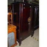 A CHINESE MOON DISC LACQUERED CABINET, PROBABLY 19TH CENTURY, FITTED WITH TWO CUPBOARD DOORS AND TWO