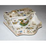 A LATE 18TH / EARLY 19TH CENTURY FRENCH FAIENCE DESK STAND, POSSIBLY BY MOUSTIERS, WITH INSET