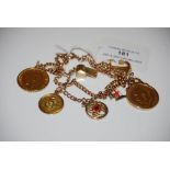 VINTAGE 9CT GOLD DOUBLE-CHAIN CHARM BRACELET SUSPENDING TWO GOLD SOVEREIGNS, ONE DATED 1915 THE