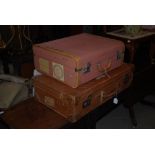 VINTAGE CANVAS AND LEATHER BOUND SUITCASE INSCRIBED 'E. LAIRD' TOGETHER WITH ANOTHER VINTAGE BROWN