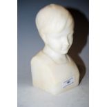 EARLY 20TH CENTURY ALABASTER BUST OF A BOY INSCRIBED ON THE BASE 'MARCH 1931'.