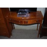 REPRODUCTION MAHOGANY AND EBONY LINED SERPENTINE SIDE TABLE WITH TWO FRIEZE DRAWERS.