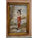 A 19TH CENTURY EMBRIODERED SILK PANEL, DEPICTING A BOY IN RED SILK OUTFIT IN A LARGE FEATHERED