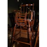 AN EARLY 20TH CENTURY SIMULATED BAMBOO CHILDS HIGH CHAIR, TOGETHER WITH ANOTHER STAINED BEECH CHILDS