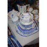 VINTAGE SHELLEY OCTAGONAL-SHAPED PART TEA SET IN THE ART DECO STYLE, DECORATED WITH BLUE FLOWERS