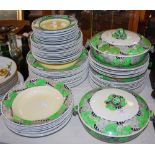 A BOUGH SCOTTISH POTTERY HAND PAINTED PART DINNER SET DECORATED WITH BLACK, WHITE, GREEN AND OCHRE