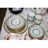 A 19TH CENTURY TURQUOISE BLUE GROUND PART TEA SET WITH GREEN AND GILDED DETAILS, PATTERN NO. 3959.