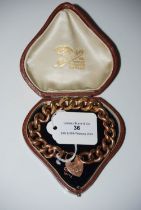 LATE 19TH/ EARLY 20TH CENTURY YELLOW METAL CURVED LINK BRACELET WITH HEART-SHAPED LOCKET, ENGRAVED