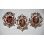 THREE FACET-CUT OVAL GLASS SALTS, EACH WITH REVERSE HAND-PAINTED PORTRAIT PANELS.