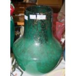 A MONART GLASS VASE, MOTTLED BLACK AND GREEN WITH GOLD COLOURED INCLUSIONS, RETAINING PART '