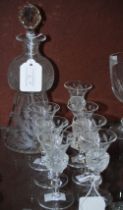 A THISTLE-SHAPED DECANTER AND STOPPER, TOGETHER WITH SEVEN MATCHING THISTLE-SHAPED LIQUEUR GLASSES.
