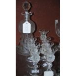 A THISTLE-SHAPED DECANTER AND STOPPER, TOGETHER WITH SEVEN MATCHING THISTLE-SHAPED LIQUEUR GLASSES.