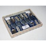 A BOXED SET OF SIX CHINESE WHITE METAL TEASPOONS