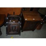 EARLY 20TH CENTURY STAINED OAK FUEL BIN WITH MASK CARVED DETAIL, BRASS AND COPPER SHOVEL TOGETHER