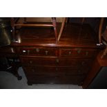 AN EARLY 18TH CENTURY AND LATER MAHOGANY, ROSEWOOD AND BOXWOOD LINED CHEST OF TWO SHORT OVER THREE