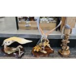 THREE SCOTTISH ART PAINTED RESIN FIGURES BY WILDTRACK, INCLUDING TWO KESTRALS AND ONE OF A BARN OWL,