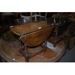 FOUR ASSORTED OAK DROP-LEAF OCCASIONAL TABLES.