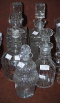COLLECTION OF FIVE ASSORTED 19TH CENTURY AND LATER DECANTERS AND STOPPERS.