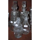 COLLECTION OF FIVE ASSORTED 19TH CENTURY AND LATER DECANTERS AND STOPPERS.