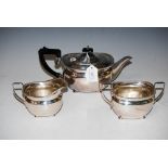 SILVER PLATED THREE-PIECE OVAL-SHPAED TEA SET.